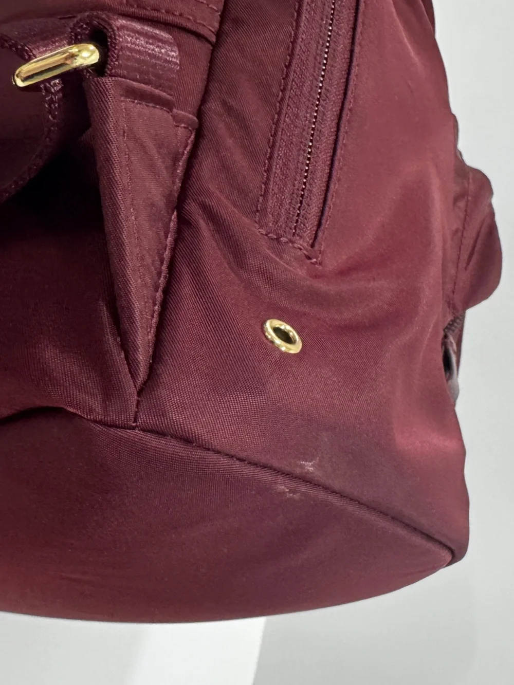 TUMI Unisex Voyageur Hilden Beetroot color Backpack with Gold Hardware